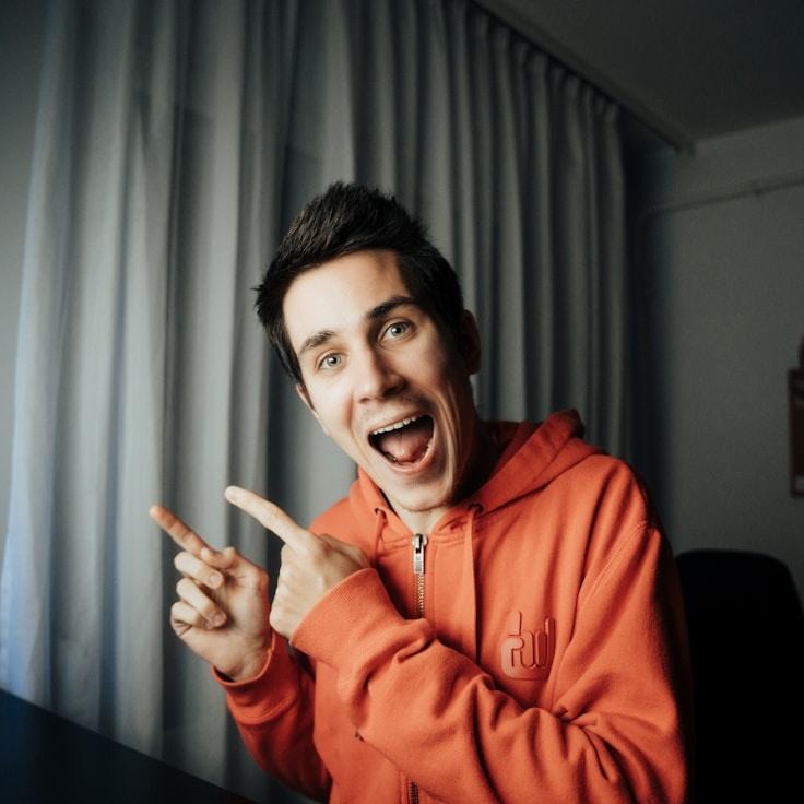 Kaveri Mehta, Lead Design Curator at SequenceLanternUnion, reviewing corporate floral arrangements